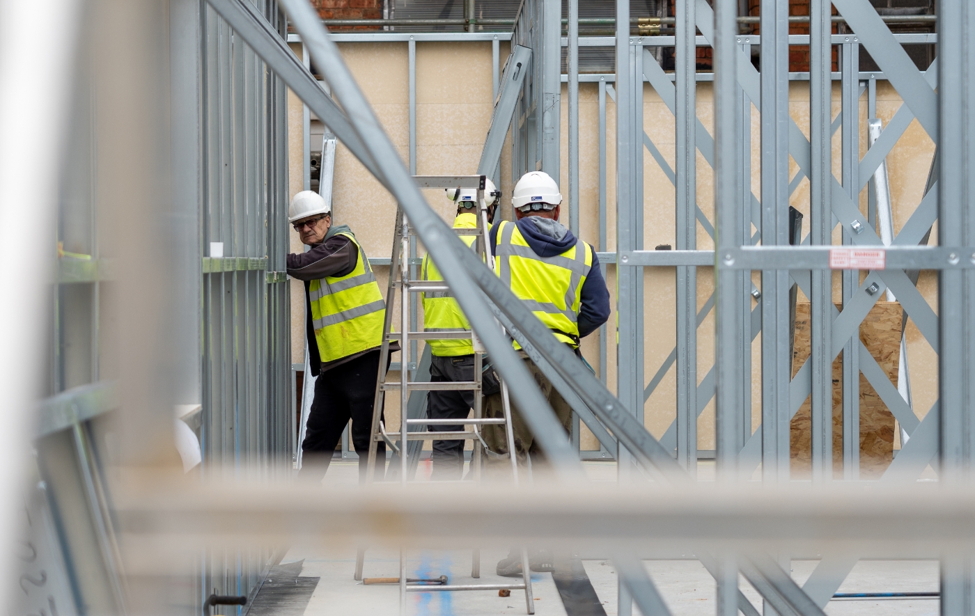 A team from Fusion installs steel framing at Kew Bridge Rise, West London.